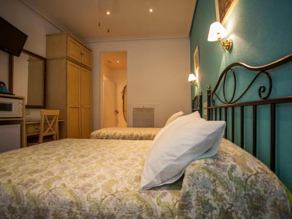 AVA Rooms : photo 2 de la chambre chambre familiale avec salle de bains privative