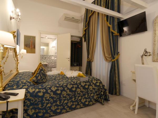 Al Mascaron Ridente : photo 6 de la chambre chambre double ou lits jumeaux