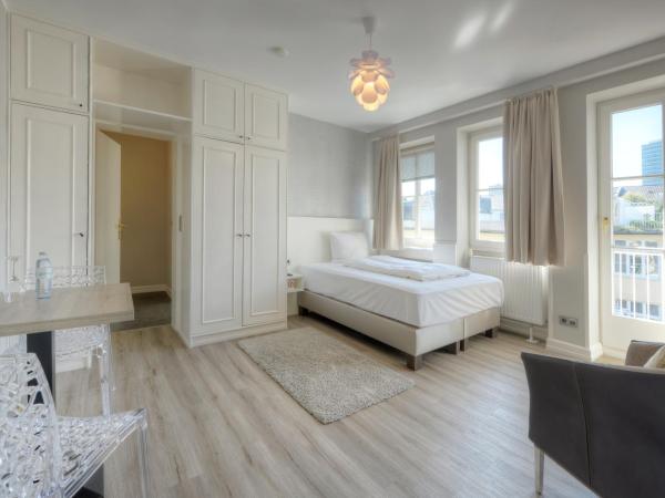 Living am Carlsplatz : photo 3 de la chambre chambre simple deluxe