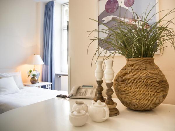 Living am Carlsplatz : photo 2 de la chambre chambre simple