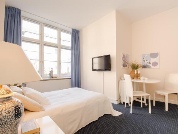 Living am Carlsplatz : photo 1 de la chambre chambre simple