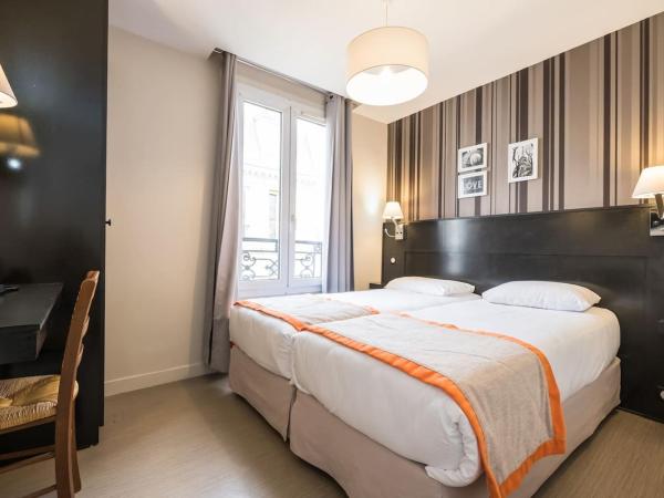 Bonséjour Montmartre : photo 1 de la chambre chambre lits jumeaux avec salle de bains privative