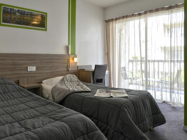 Hôtel Le Relais Dax : photo 2 de la chambre chambre lits jumeaux avec balcon