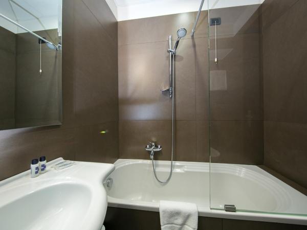 Mediterranea Hotel & Convention Center : photo 9 de la chambre chambre triple