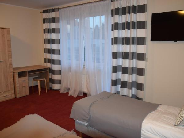 Botanik Hostel : photo 9 de la chambre chambre quadruple avec salle de bains commune