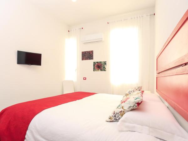 La Posidonia Oceanica : photo 2 de la chambre chambre double ou lits jumeaux avec salle de bains privative