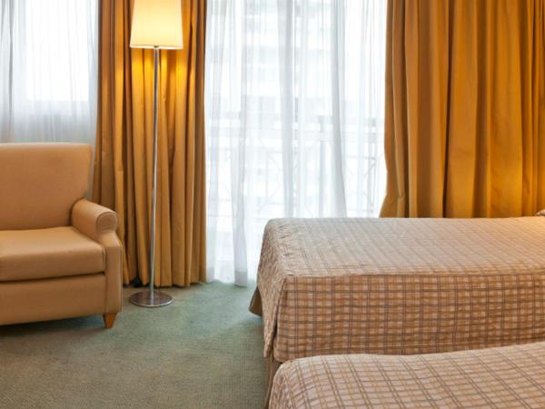 Bourbon Barra da Tijuca Residence : photo 9 de la chambre chambre lits jumeaux supérieure