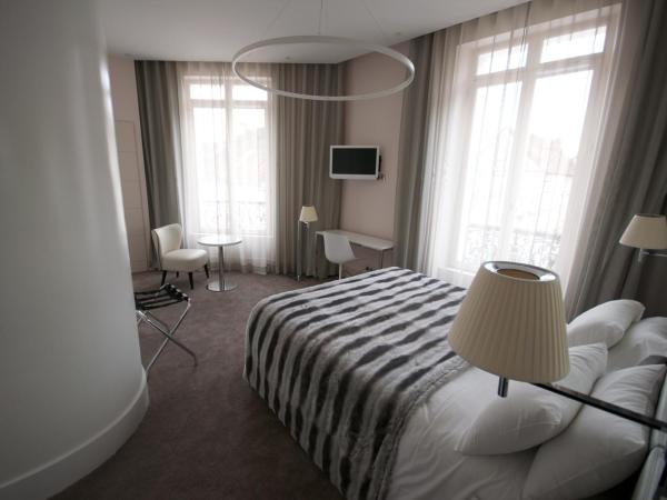 Le César Hôtel : photo 7 de la chambre chambre deluxe double ou lits jumeaux