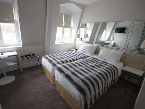 Le César Hôtel : photo 1 de la chambre chambre double ou lits jumeaux supérieure