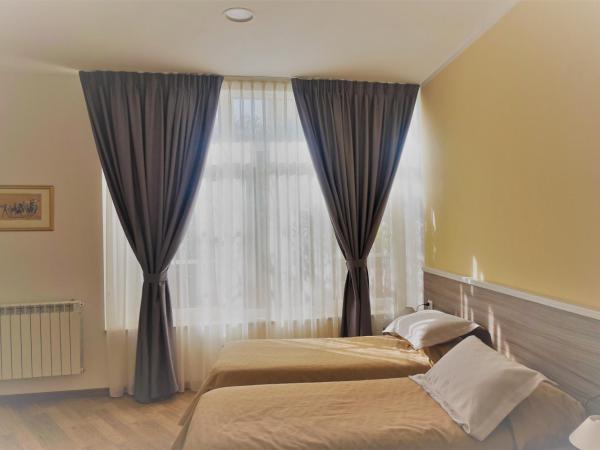 B&B I Tetti di Siena : photo 6 de la chambre chambre double ou lits jumeaux Économique - vue sur jardin