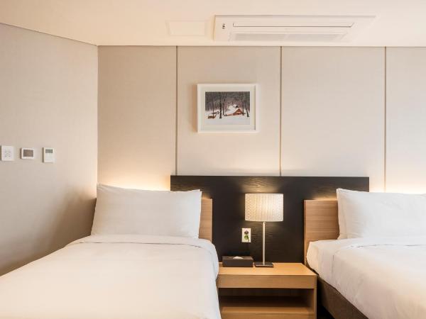 First Stay Hotel : photo 3 de la chambre chambre lits jumeaux deluxe