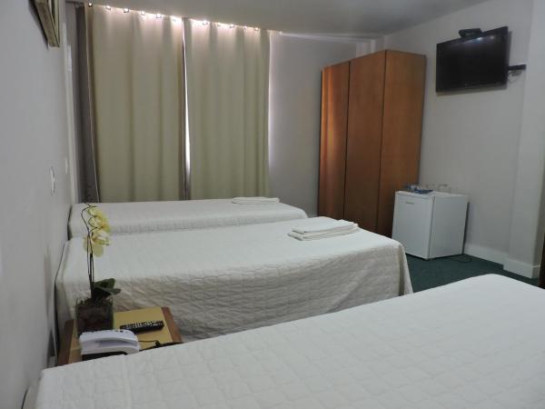 Rede Andrade San Martin : photo 4 de la chambre chambre triple standard avec 3 lits simples