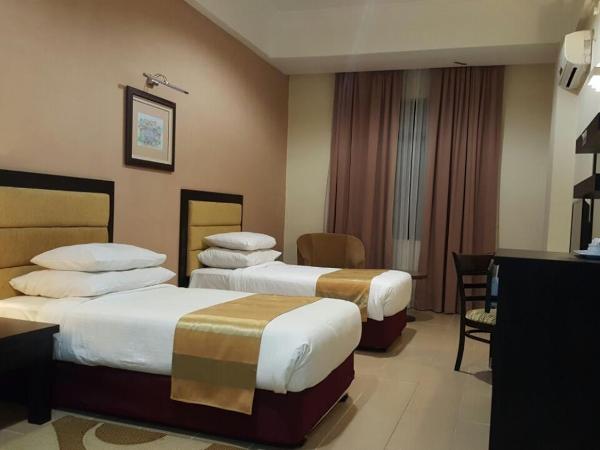 Puteri Bay Hotel : photo 4 de la chambre chambre lits jumeaux deluxe