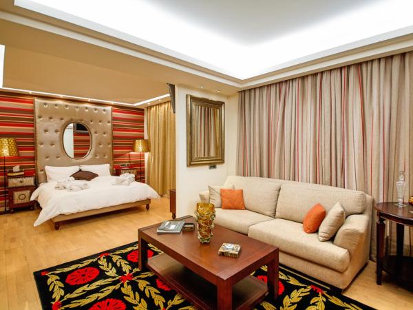 Comfy Boutique Hotel : photo 2 de la chambre suite avec jacuzzi