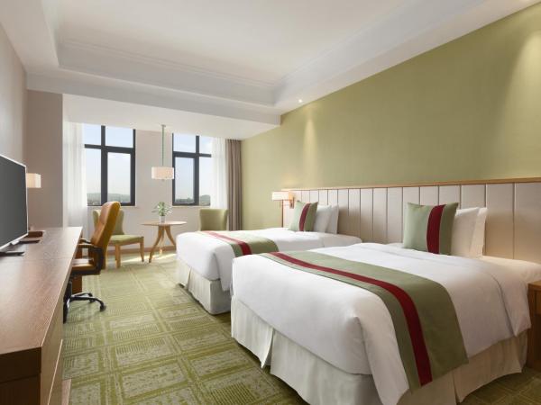 Ramada Suzhou : photo 1 de la chambre chambre lits jumeaux