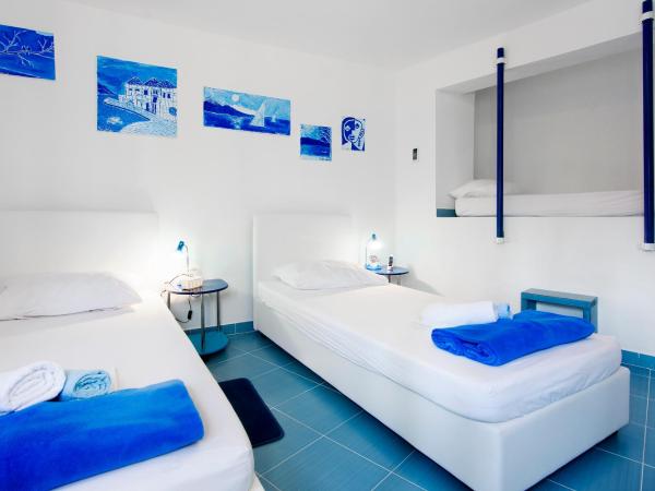 Old City Rooms : photo 7 de la chambre chambre double ou lits jumeaux avec lit d'appoint