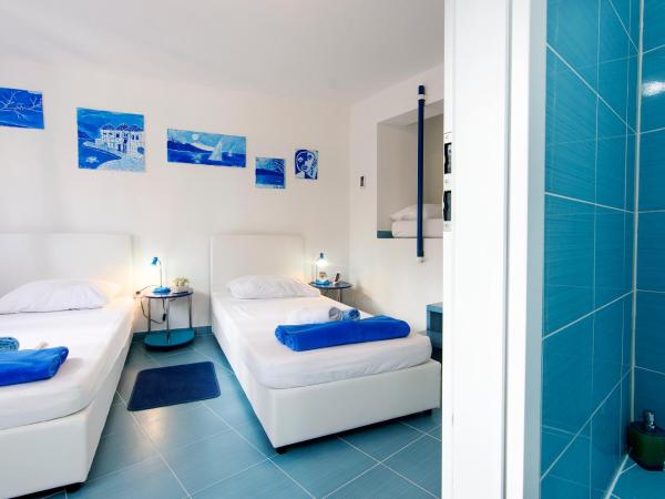 Old City Rooms : photo 4 de la chambre chambre double ou lits jumeaux avec lit d'appoint