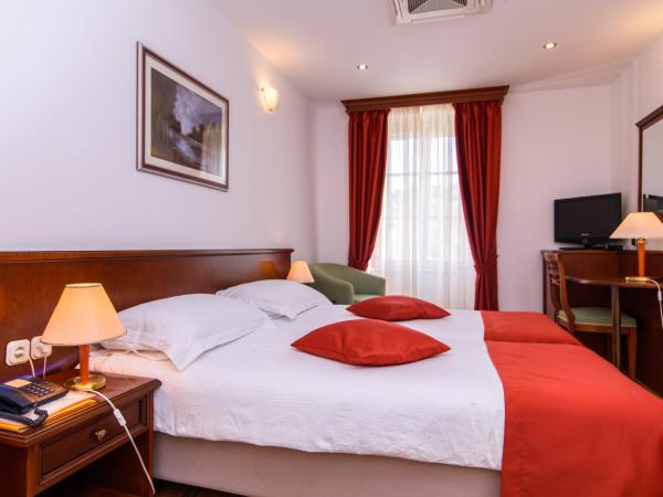 Heritage Hotel Vila Sikaa : photo 5 de la chambre chambre supérieure