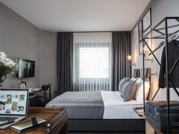 Hotel Cinnah : photo 1 de la chambre chambre deluxe