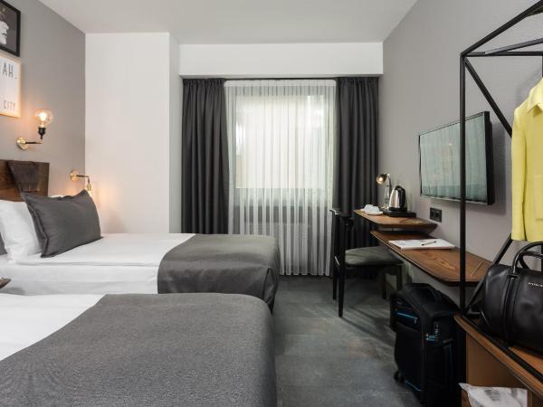 Hotel Cinnah : photo 1 de la chambre chambre lits jumeaux standard