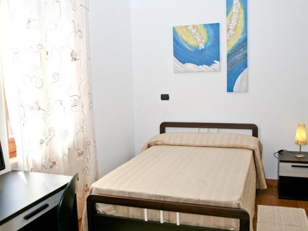 Villa Marogna : photo 1 de la chambre chambre simple avec petit lit double
