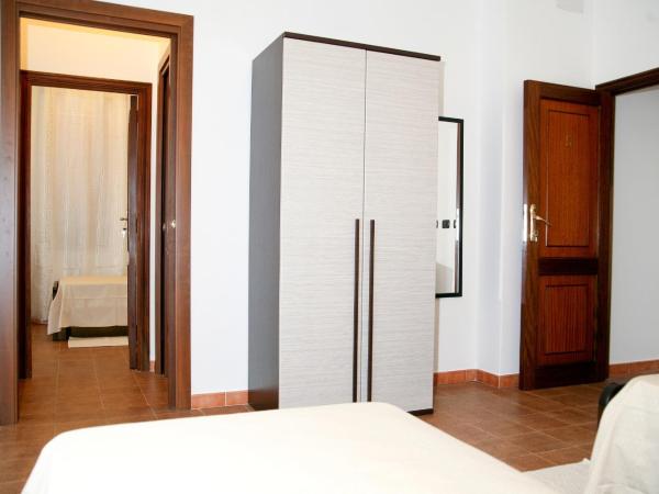 Villa Marogna : photo 2 de la chambre chambre quadruple avec balcon 