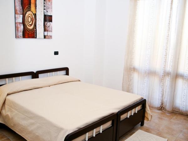 Villa Marogna : photo 1 de la chambre chambre quadruple avec balcon 