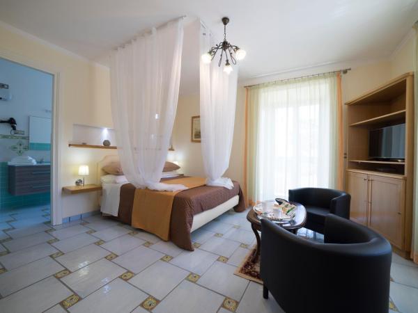 B&B 'O Sole Mio! : photo 3 de la chambre suite - vue sur jardin