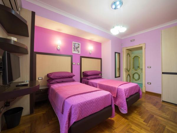 B&B 'O Sole Mio! : photo 2 de la chambre chambre double ou lits jumeaux deluxe - vue sur ville