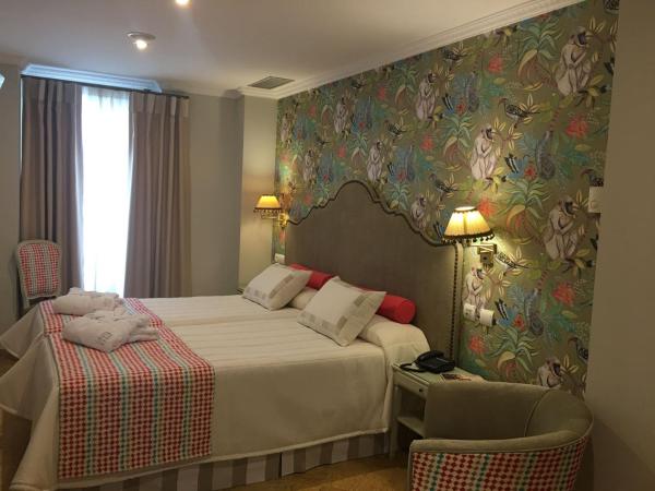 Adriano Boutique Sevilla : photo 9 de la chambre chambre lits jumeaux