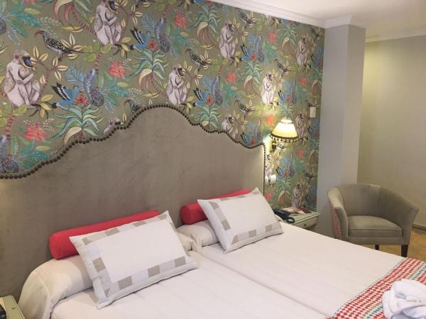 Adriano Boutique Sevilla : photo 7 de la chambre chambre lits jumeaux