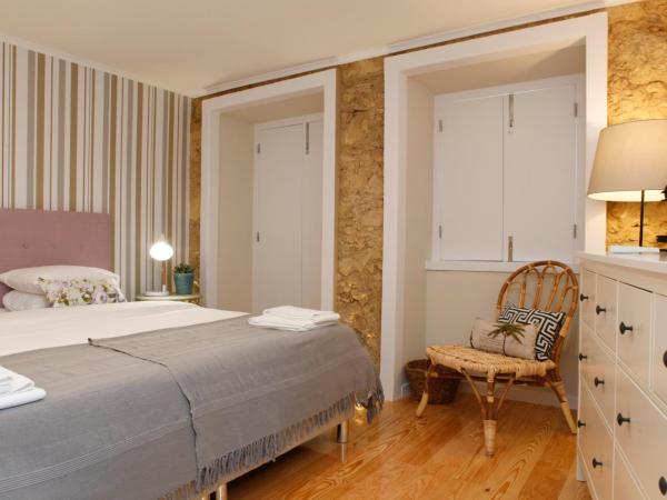 Flores Guest House : photo 5 de la chambre chambre double ou lits jumeaux - vue sur jardin