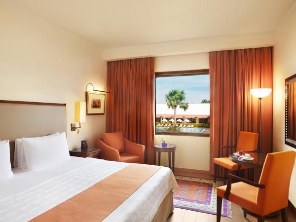 Trident Agra : photo 1 de la chambre chambre double ou lits jumeaux deluxe - vue sur piscine