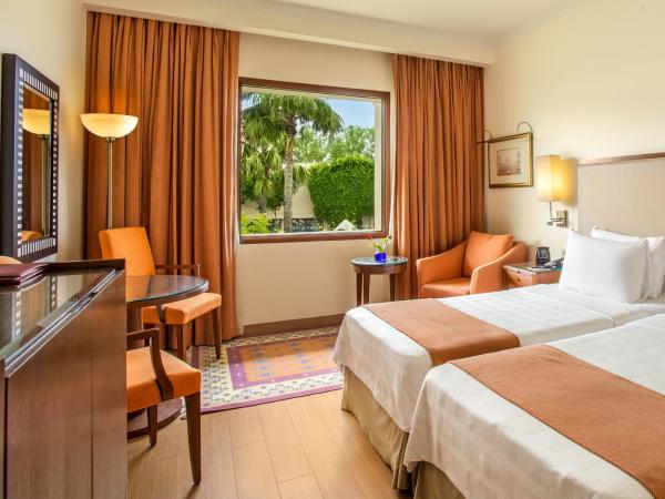 Trident Agra : photo 2 de la chambre chambre double ou lits jumeaux deluxe - vue sur piscine