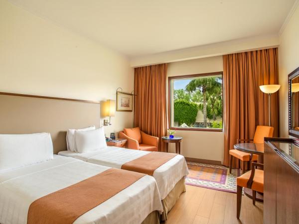 Trident Agra : photo 3 de la chambre chambre double ou lits jumeaux deluxe - vue sur piscine