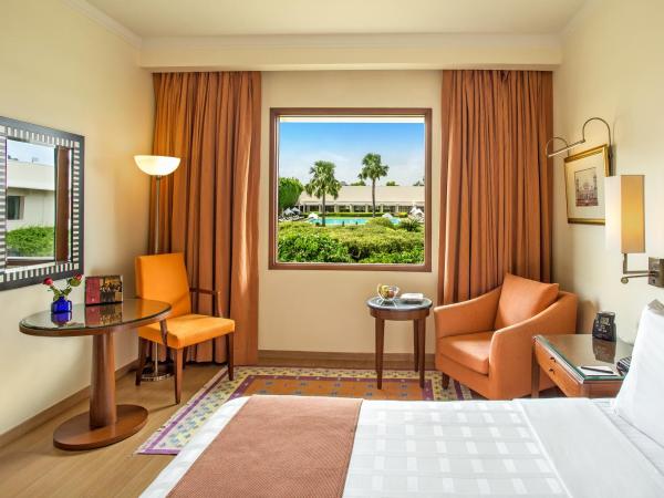 Trident Agra : photo 4 de la chambre chambre double ou lits jumeaux deluxe - vue sur piscine
