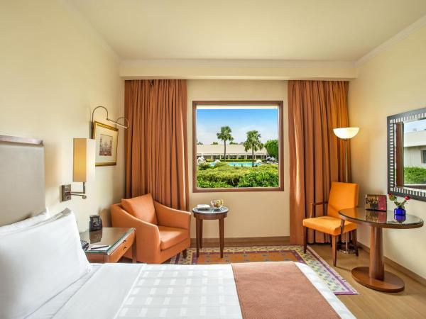 Trident Agra : photo 5 de la chambre chambre double ou lits jumeaux deluxe - vue sur piscine