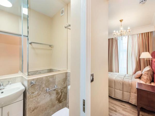 London Residence : photo 3 de la chambre chambre simple avec douche 