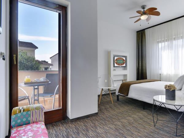 Villa Milli B&B : photo 6 de la chambre chambre double ou lits jumeaux deluxe avec balcon