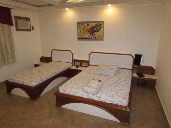 Pleasant Place Hotel : photo 1 de la chambre chambre triple standard