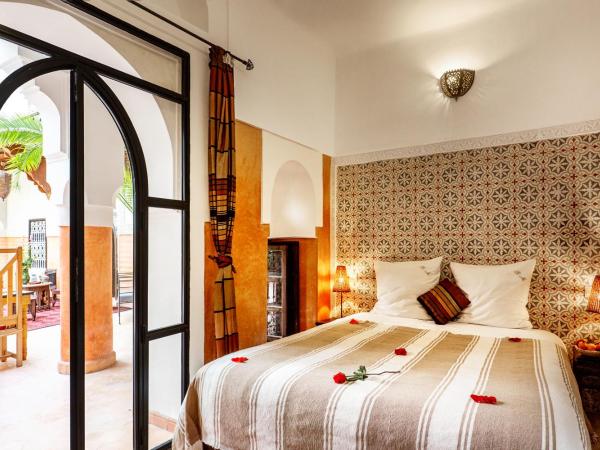 Riad Jnan El Cadi : photo 5 de la chambre chambre double de luxe - vue sur terrasse