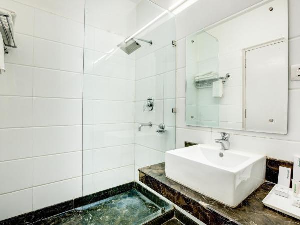 Treebo C T International : photo 5 de la chambre chambre deluxe double ou lits jumeaux