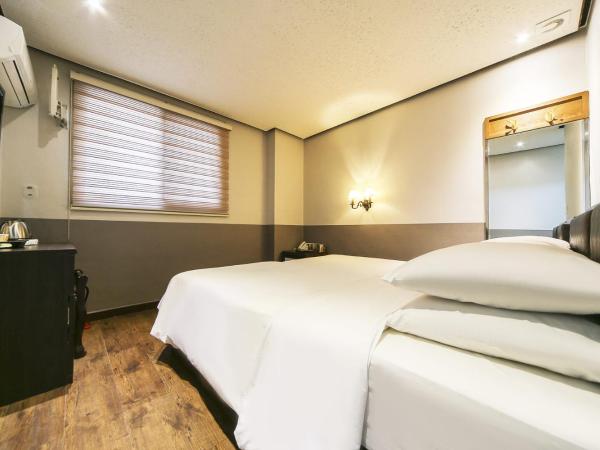 Friendly DH Naissance Hotel by Mindrum Group : photo 9 de la chambre chambre lits jumeaux Économique - petit-déjeuner inclus