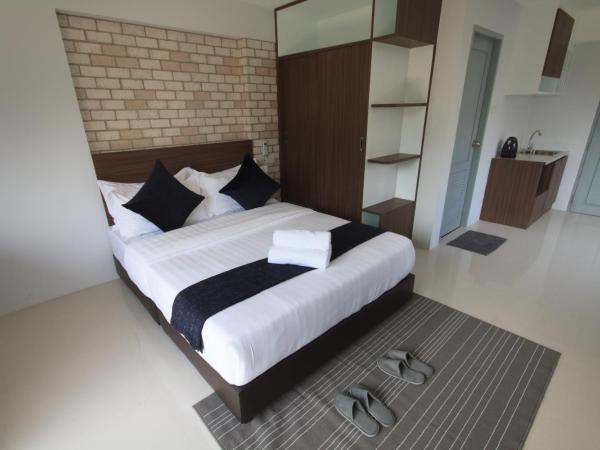 Q Space Residence : photo 7 de la chambre chambre d'angle de luxe avec balcon