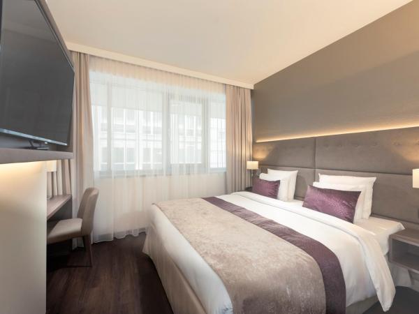 Wyndham Grand Salzburg Conference Centre : photo 3 de la chambre suite affaires