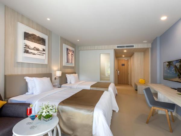 X10 Khaolak Resort : photo 7 de la chambre chambre double ou lits jumeaux de luxe - accès à la piscine - aile plage