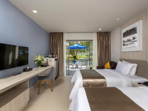 X10 Khaolak Resort : photo 9 de la chambre chambre double ou lits jumeaux de luxe - accès à la piscine - aile plage