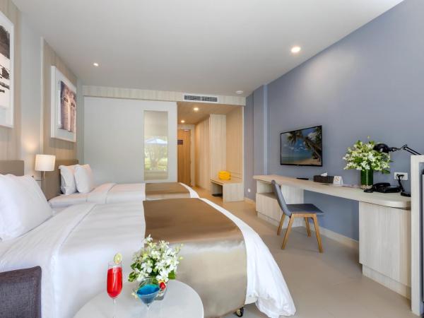 X10 Khaolak Resort : photo 8 de la chambre chambre double ou lits jumeaux de luxe - accès à la piscine - aile plage