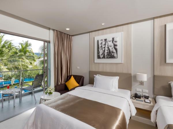 X10 Khaolak Resort : photo 7 de la chambre chambre double ou lits jumeaux de luxe - vue sur piscine - aile plage