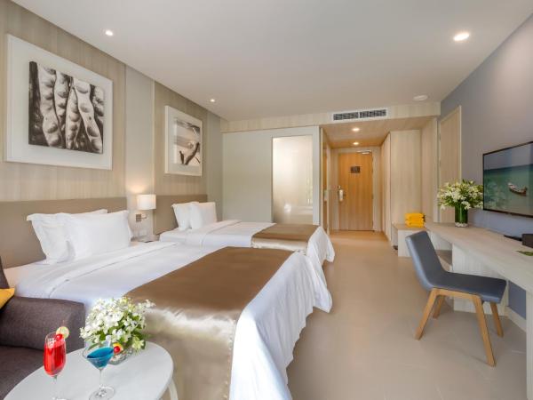 X10 Khaolak Resort : photo 6 de la chambre chambre double ou lits jumeaux de luxe - vue sur piscine - aile plage